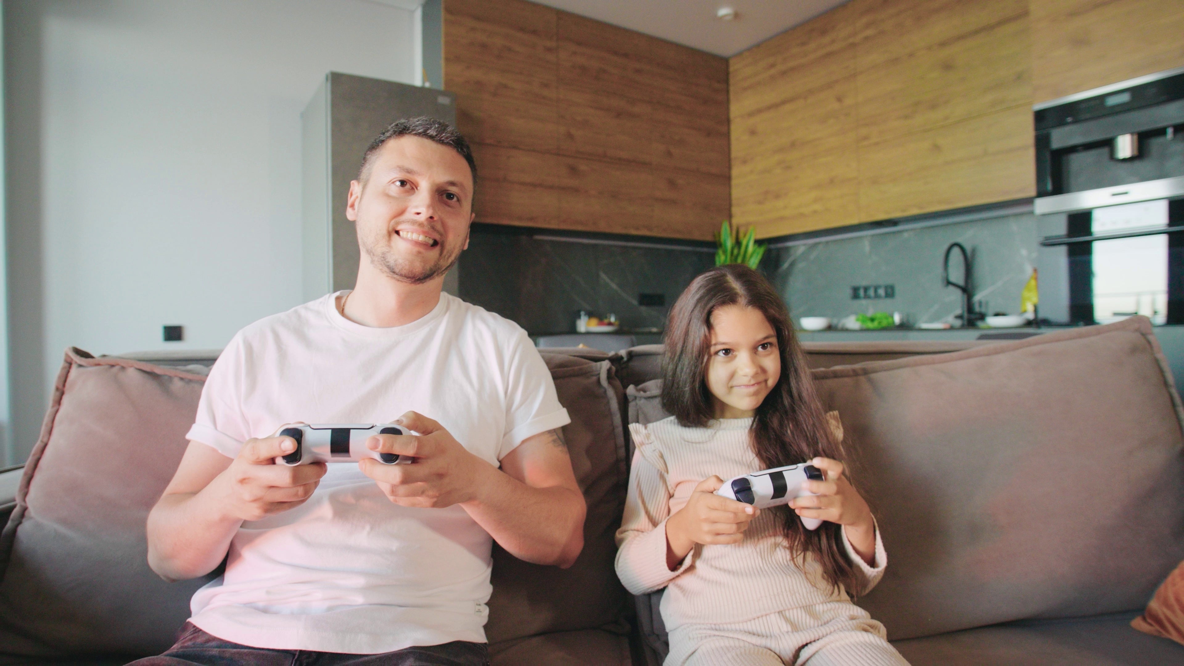 Father and daughter playing games